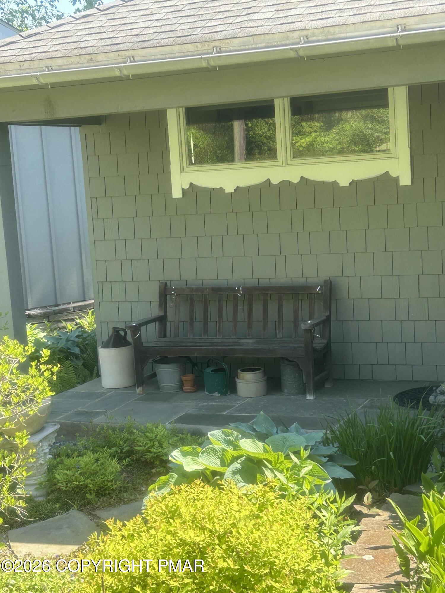 4379 River Road Mount Bethel, PA 18343 - Photo 4 of 48 a view of a backyard with plants