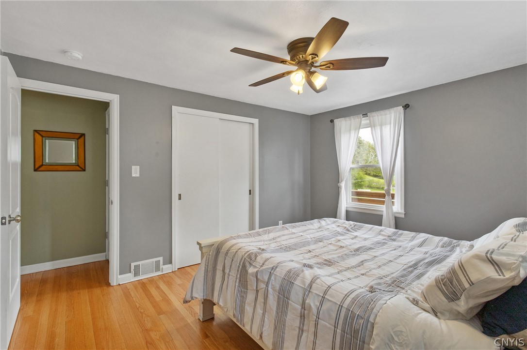 132 East Manchester Road Geddes, NY 13219 - Photo 24 of 44 This bedroom with a double-door closet sits at the
