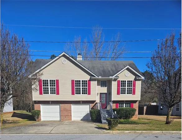 a house with trees in the background