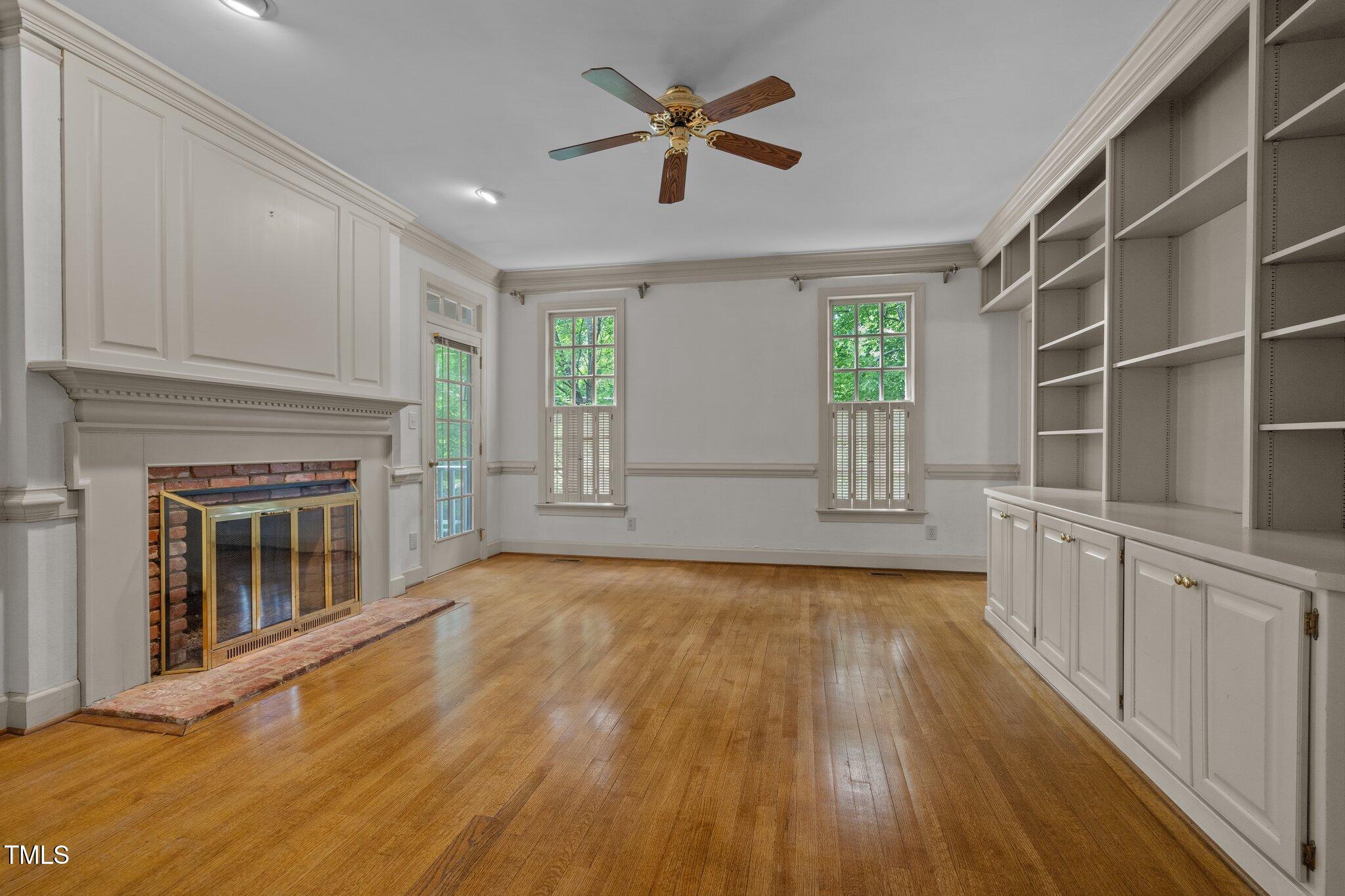 2113 Fallon Oaks Court Raleigh, NC 27608 - Photo 11 of 23 Living Rm/Den with FP and Built-ins