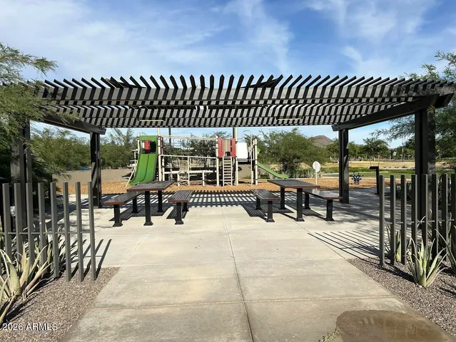 a view of dining room with furniture and garden