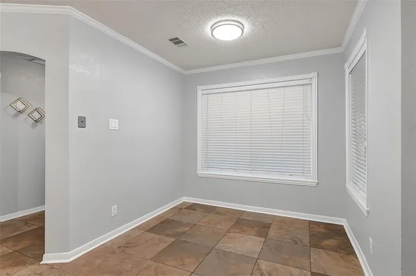 a view of a hallway with staircase