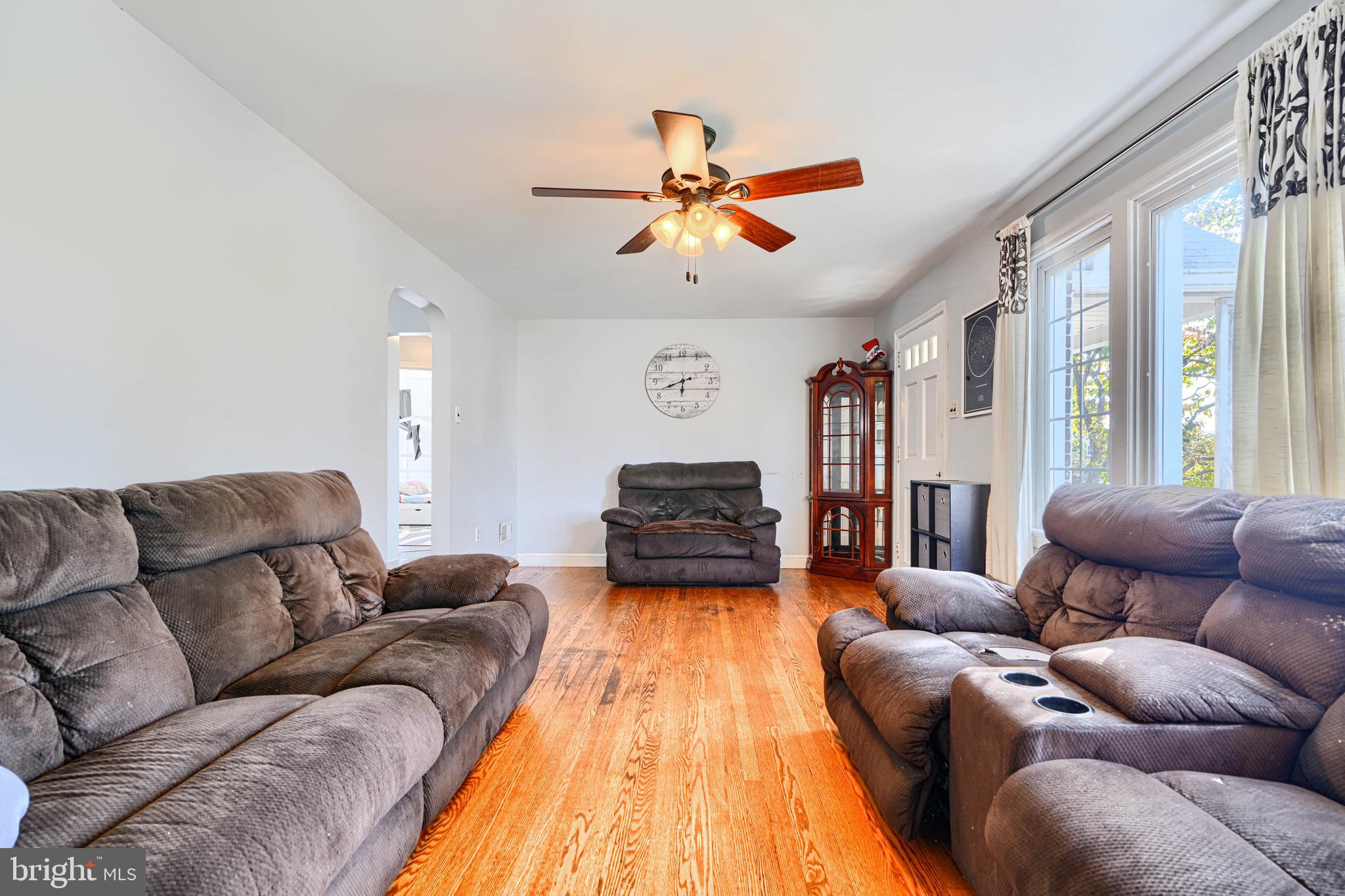 741 South Russell Street York, PA 17402 - Photo 11 of 32 a living room with furniture ceiling fan and a rug