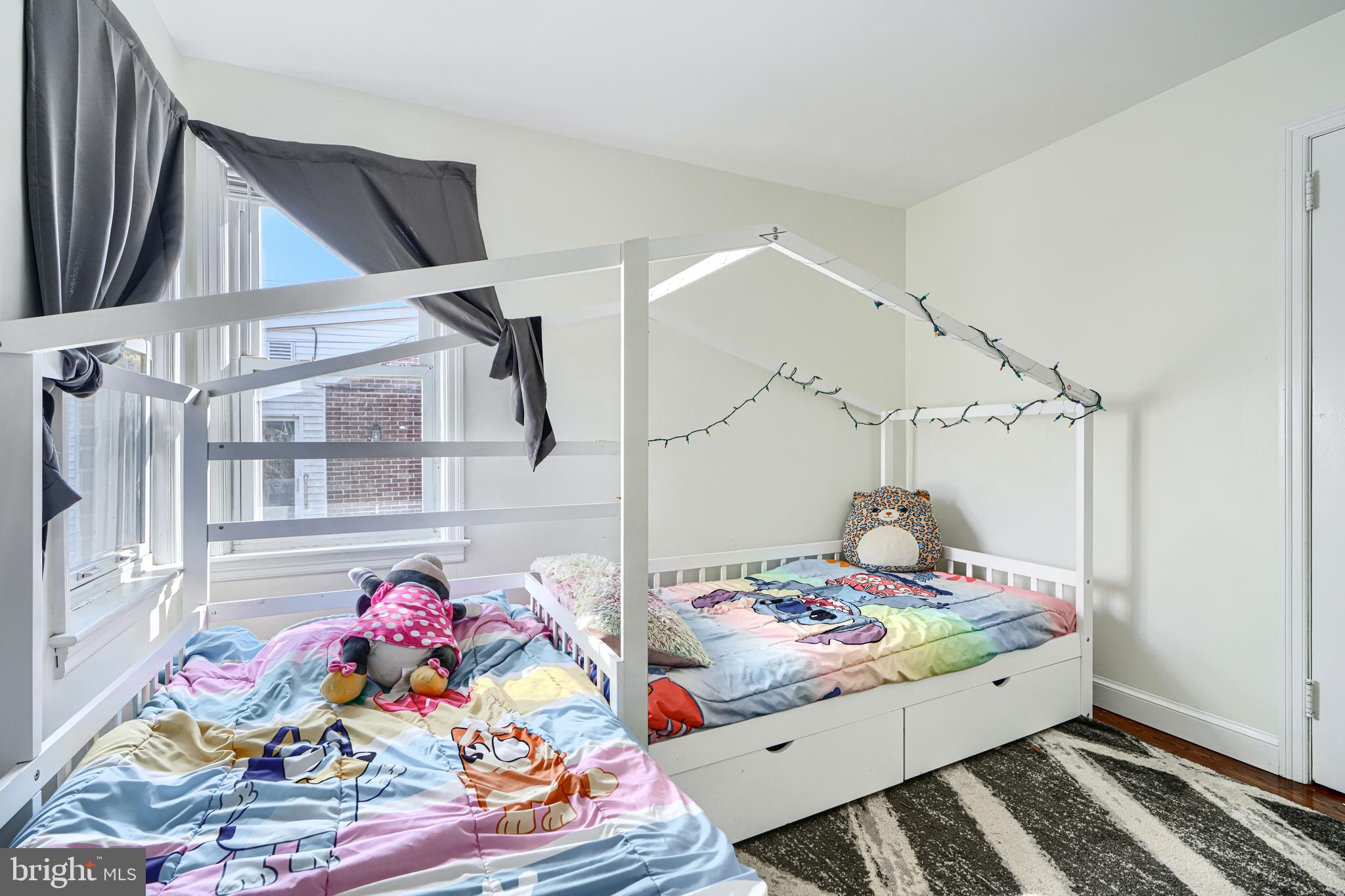 741 South Russell Street York, PA 17402 - Photo 20 of 32 a bed room with a bed and a table