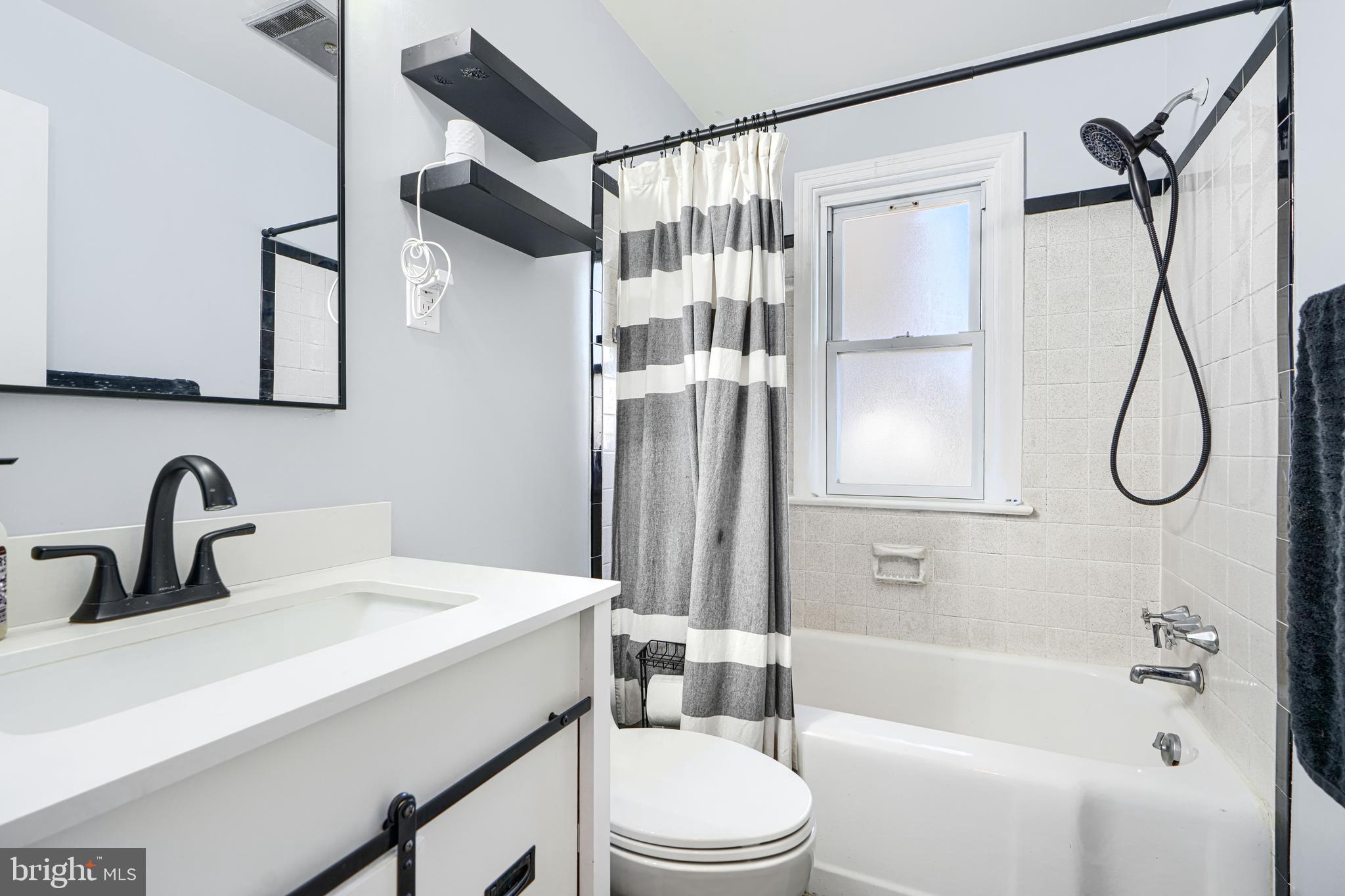 741 South Russell Street York, PA 17402 - Photo 26 of 32 a bathroom with a sink toilet and shower