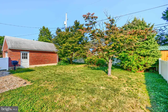 a fire hydrant in the middle of a field