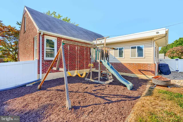 a house view with a backyard space