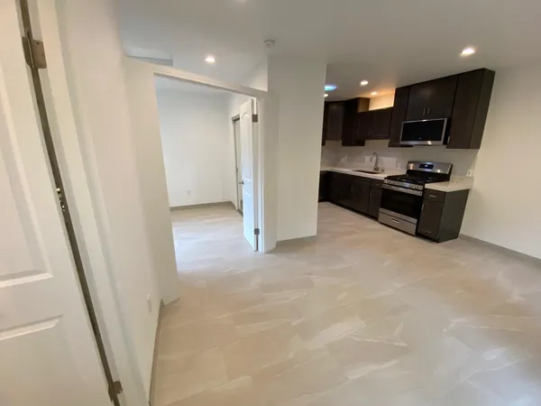 a view of empty room with front door