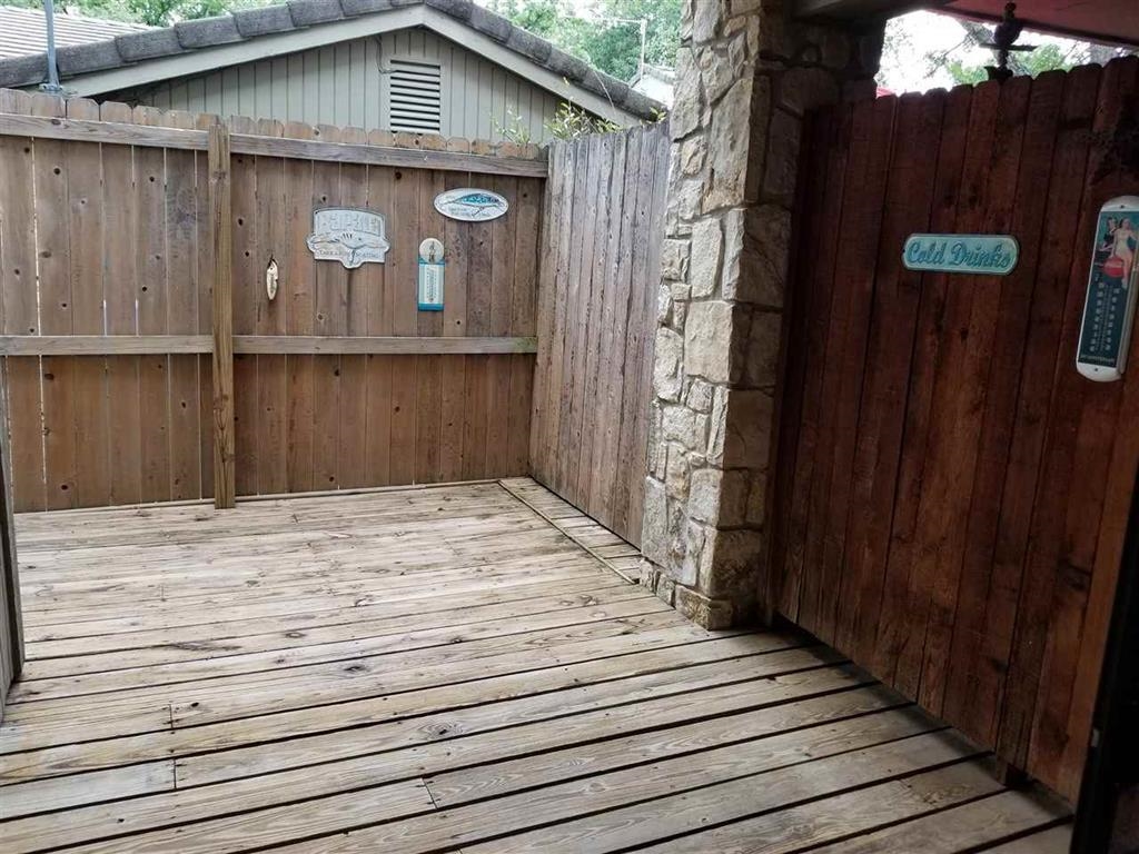 103 Dawn, Unit 4 Horseshoe Bay, TX 78657 - Photo 5 of 6 a backyard of a house