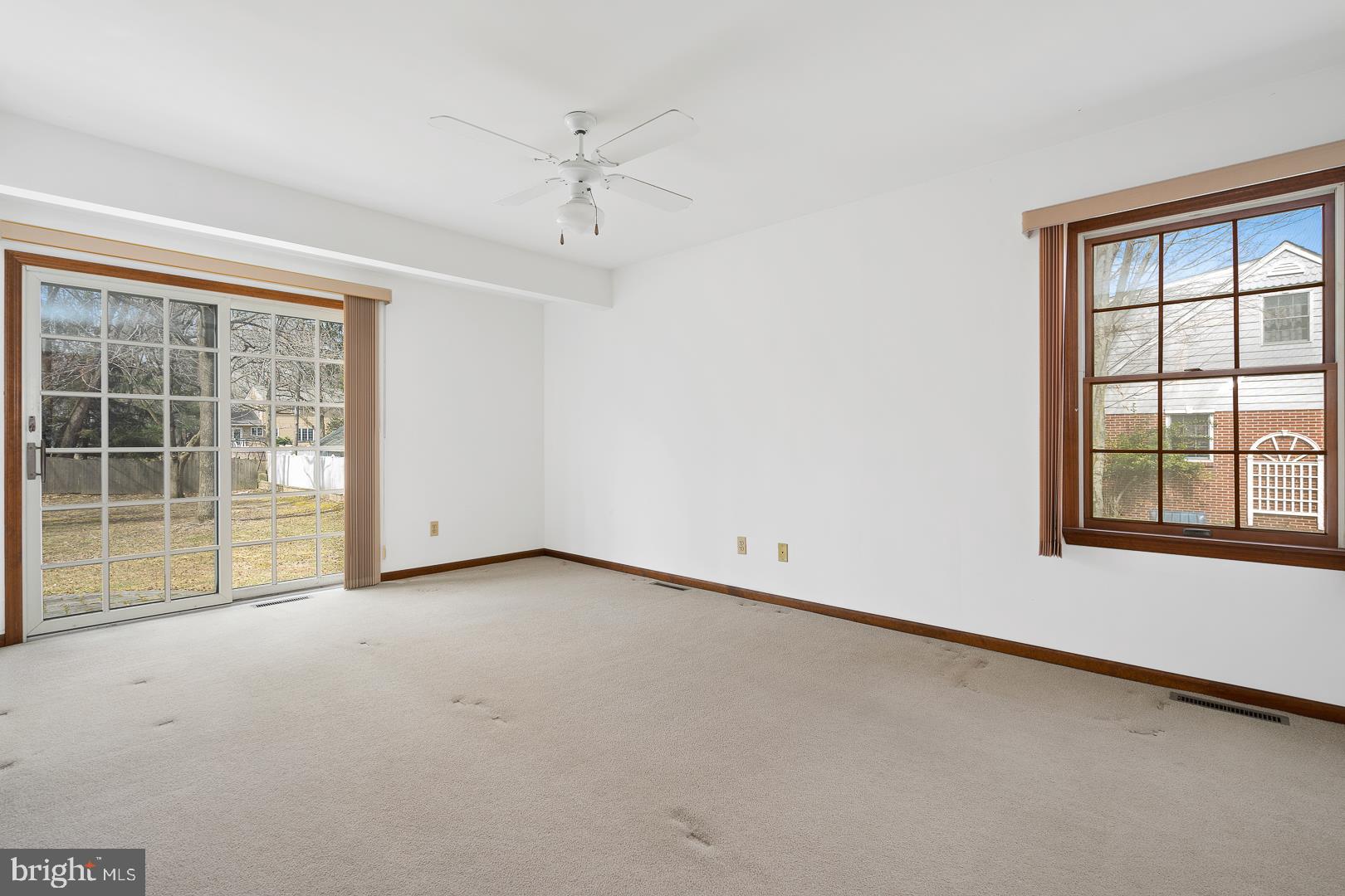 29 Penn Lyle Road Princeton Junction, NJ 08550 - Photo 8 of 21 First floor bedroom with sliding door to rear yard