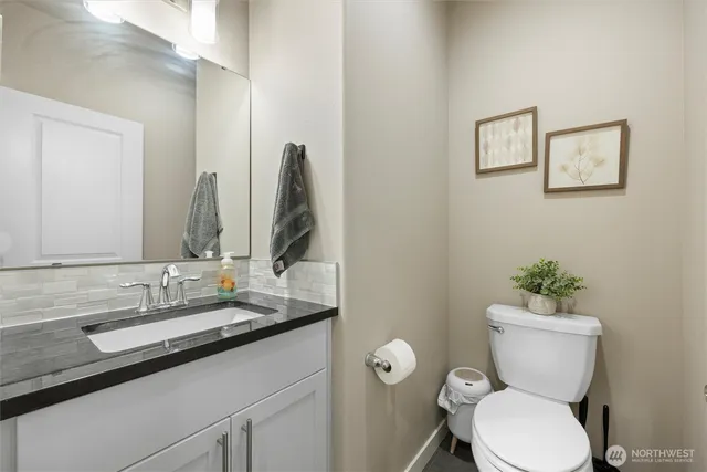 a view of a dining area with furniture and wooden floor