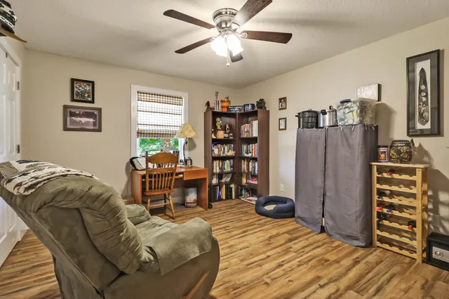 a bedroom with furniture and a bed