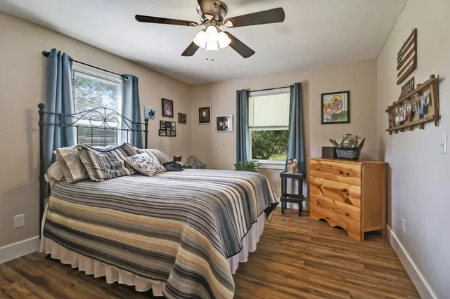 a bed room with a bed and a window