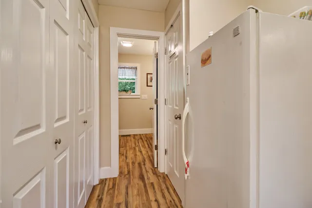 a view of a bathroom from a hallway