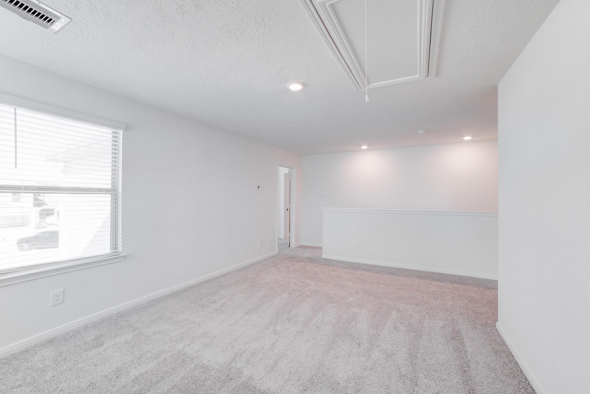 9307 Central Place Magnolia, TX 77354 - Photo 14 of 21 an empty room with a window