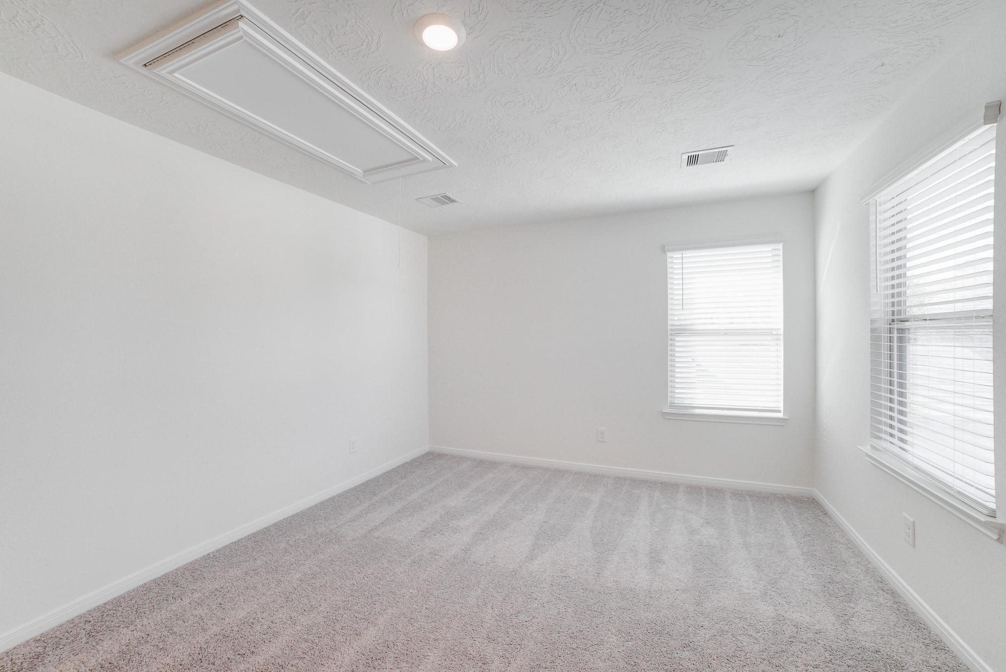 9307 Central Place Magnolia, TX 77354 - Photo 15 of 21 an empty room with windows