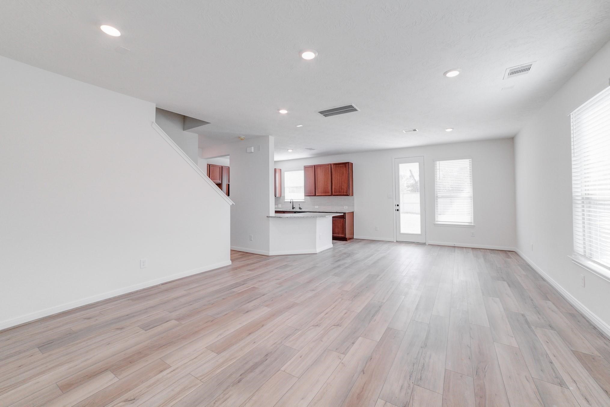 9307 Central Place Magnolia, TX 77354 - Photo 20 of 21 a view of empty room with wooden floor and window
