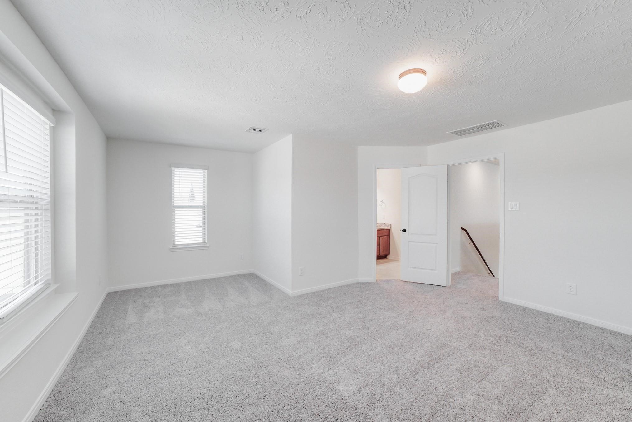 9307 Central Place Magnolia, TX 77354 - Photo 6 of 21 an empty room with windows