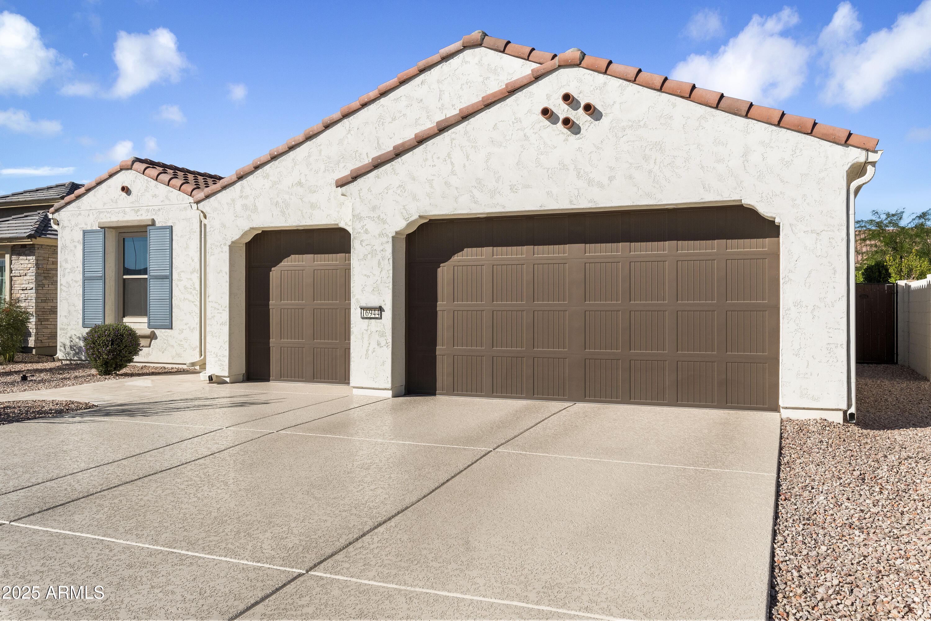 16944 West Coronado Road Goodyear, AZ 85395 - Photo 28 of 39 Textured and Painted Driveway