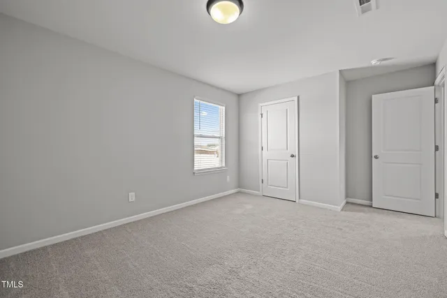 a view of workspace with furniture and window