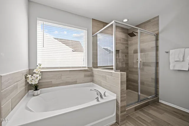 a bathroom with a granite countertop sink mirror and double
