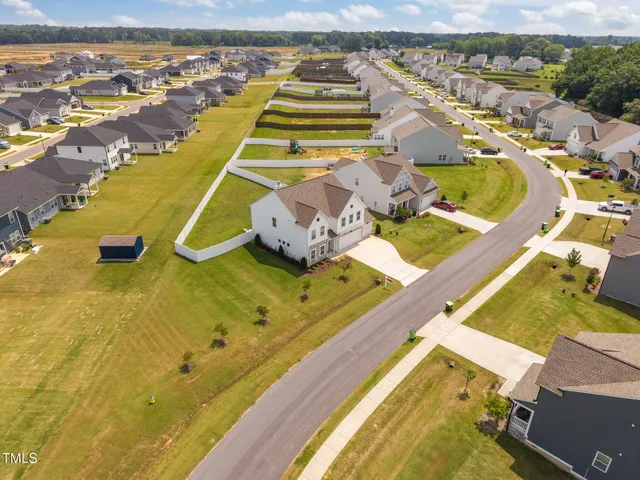 a view of a big yard with an empty room