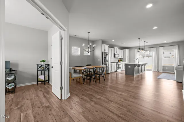 an aerial view of a house with a swimming pool