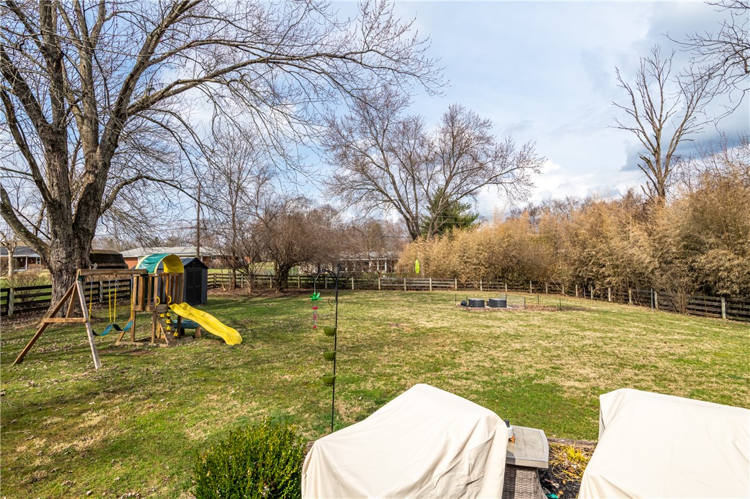 4102 Ridgetop Drive Bellbrook, OH 45305 - Photo 31 of 33 This spacious backyard offers a perfect setting for outdoor recreation and relaxation.