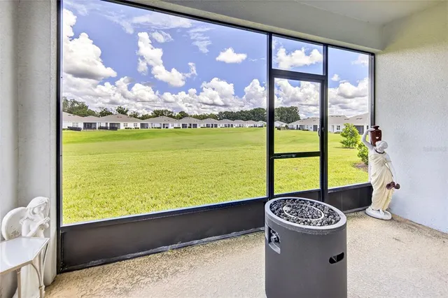 a view of a picture of a room with a large window