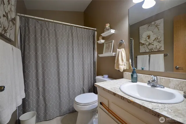 a view of a table and chairs in the patio