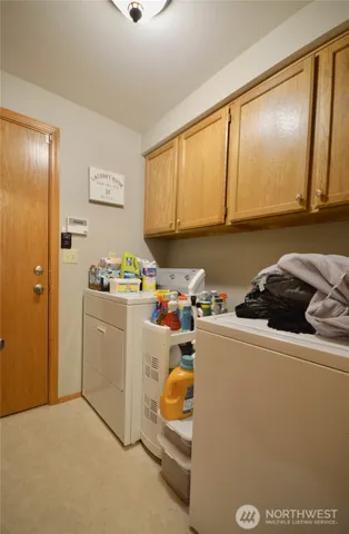 a view of swimming pool with outdoor seating and lake
