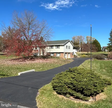 a view of a street with a building in the background
