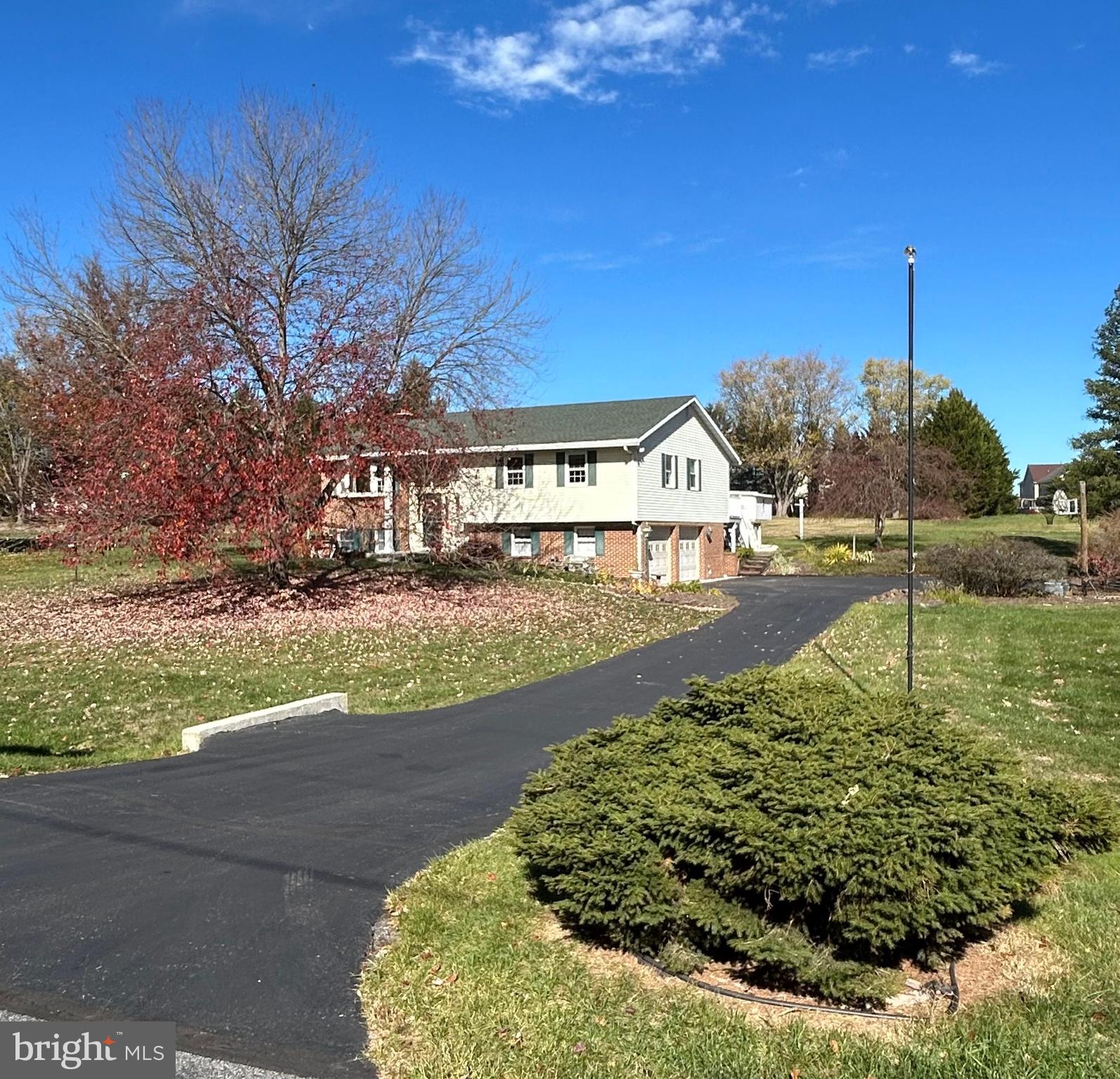 a view of a street with a building in the background
