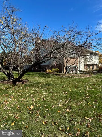 a view of a lake with a big yard