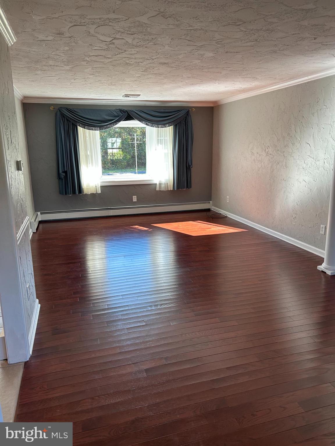 95 Table Rock Road Gettysburg, PA 17325 - Photo 6 of 31 an empty room with wooden floor and windows
