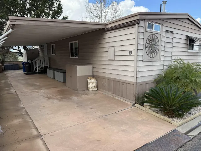 a view of a house with a garage