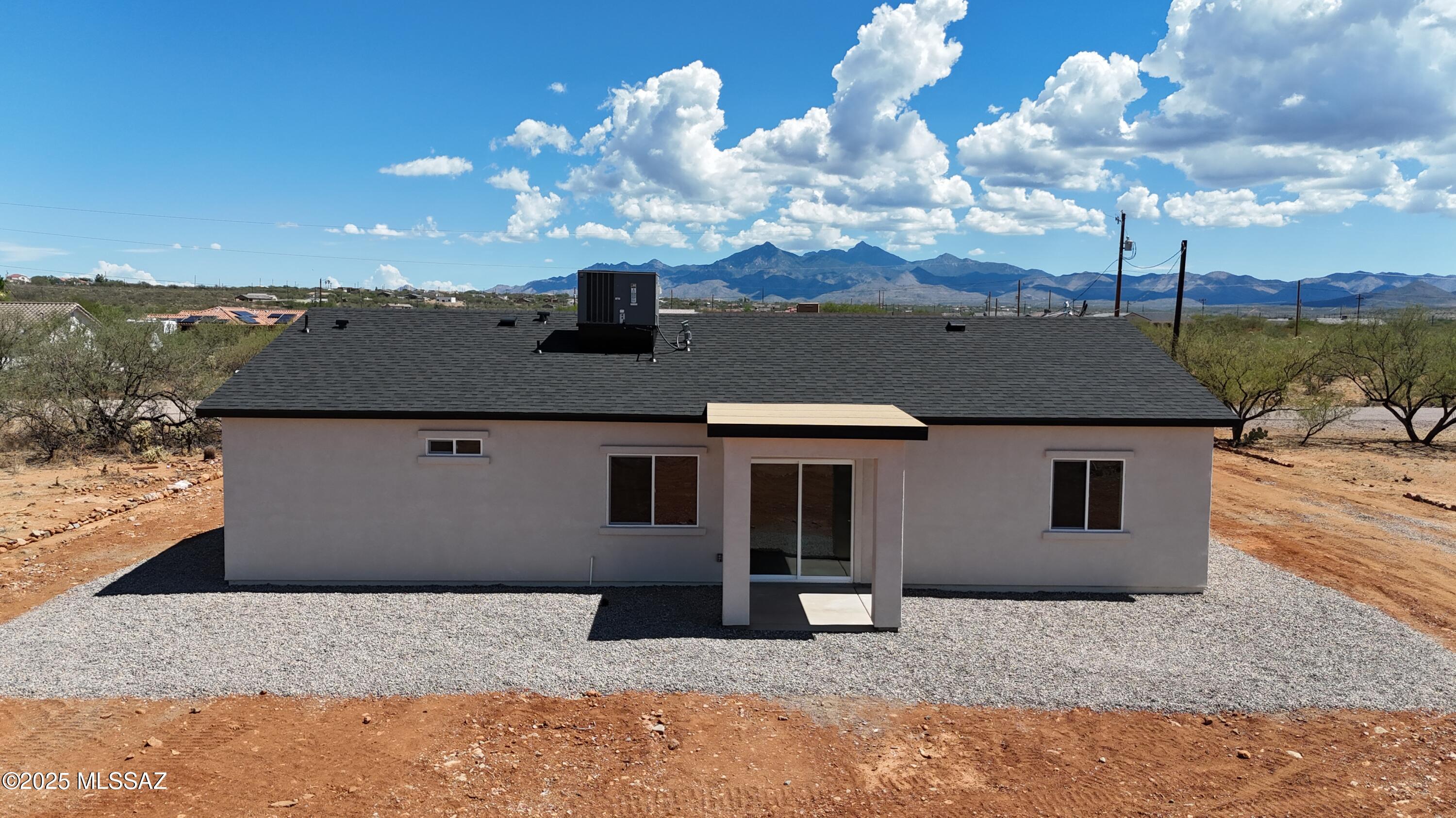 1786 Palestina Corte Rio Rico, AZ 85648 - Photo 8 of 28 a view of a house with a yard