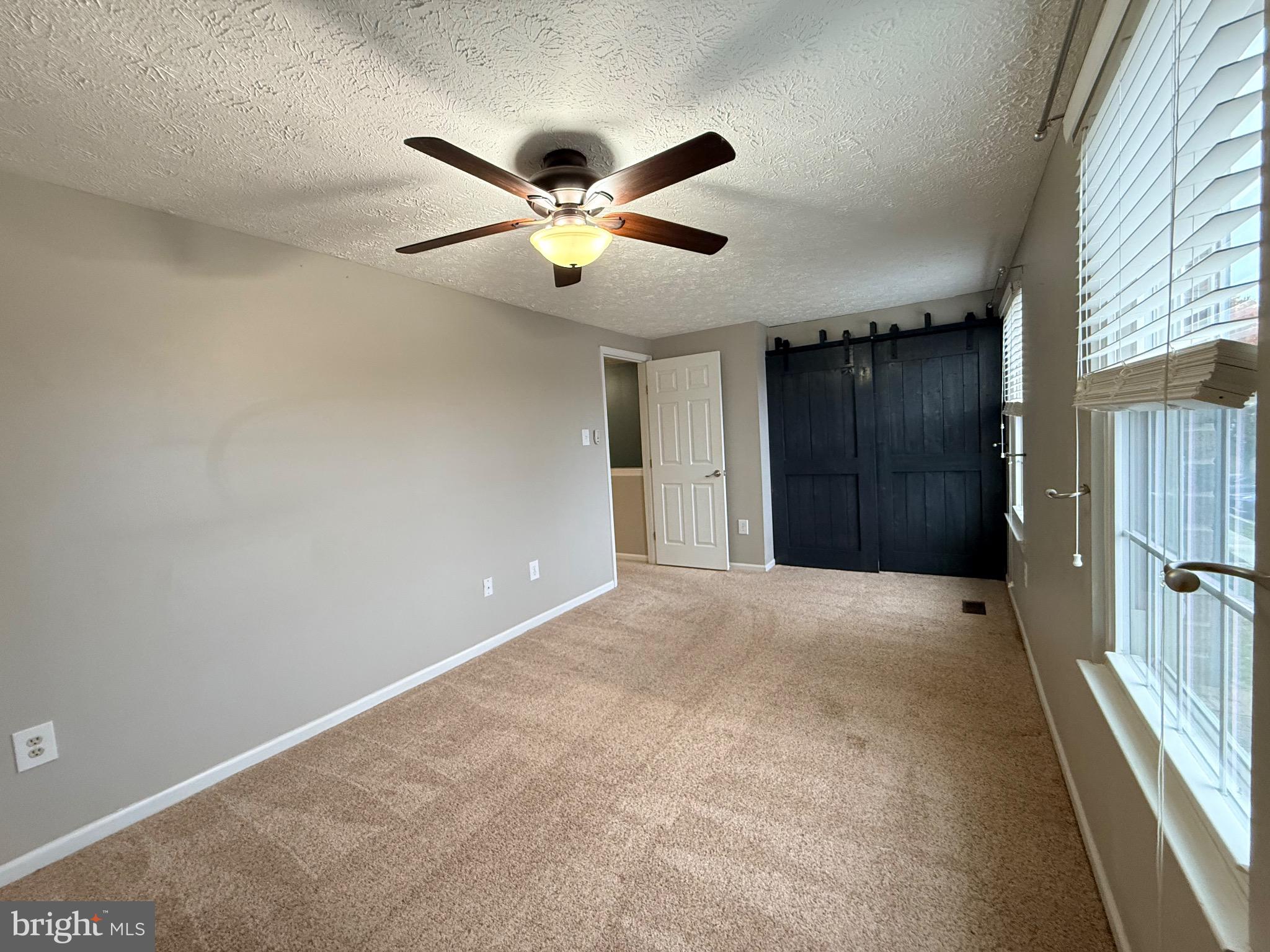 3750 Timahoe Circle Baltimore, MD 21236 - Photo 11 of 29 a view of an empty room with a window