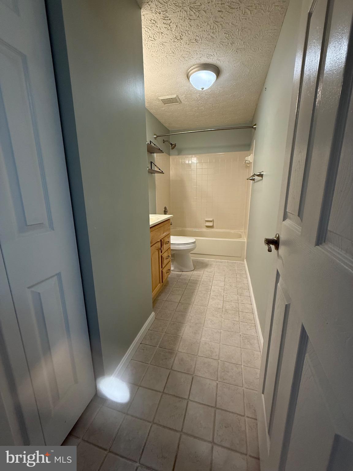 3750 Timahoe Circle Baltimore, MD 21236 - Photo 14 of 29 a bathroom with a sink a toilet and a mirror