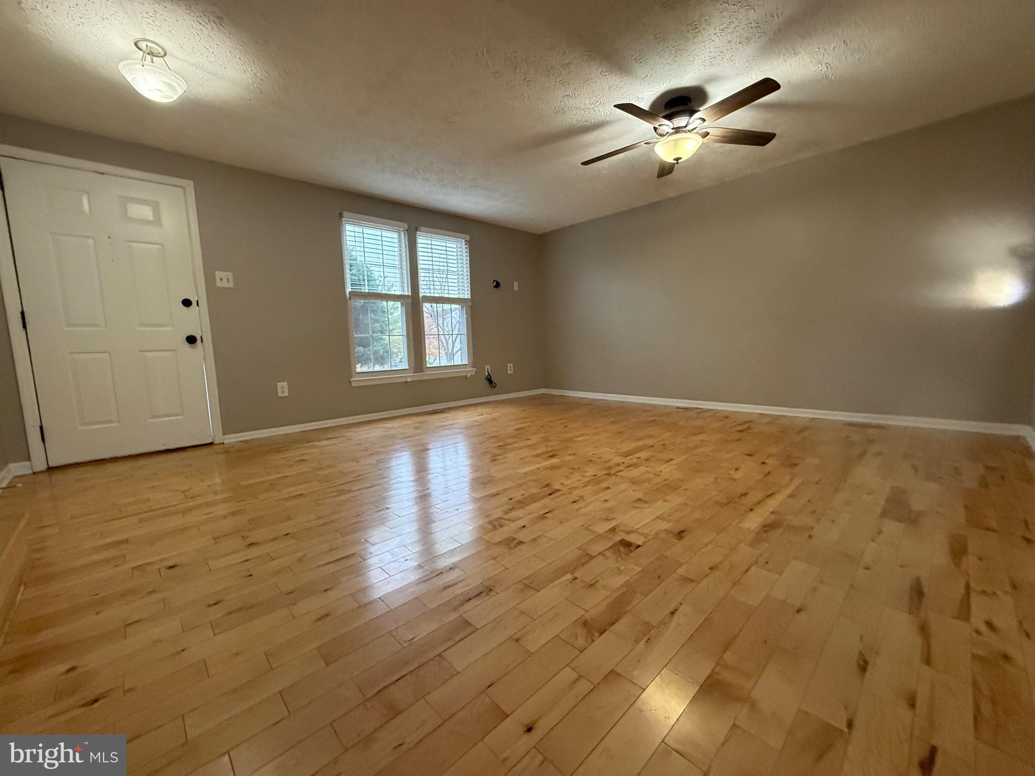 3750 Timahoe Circle Baltimore, MD 21236 - Photo 2 of 29 a view of an empty room with a window