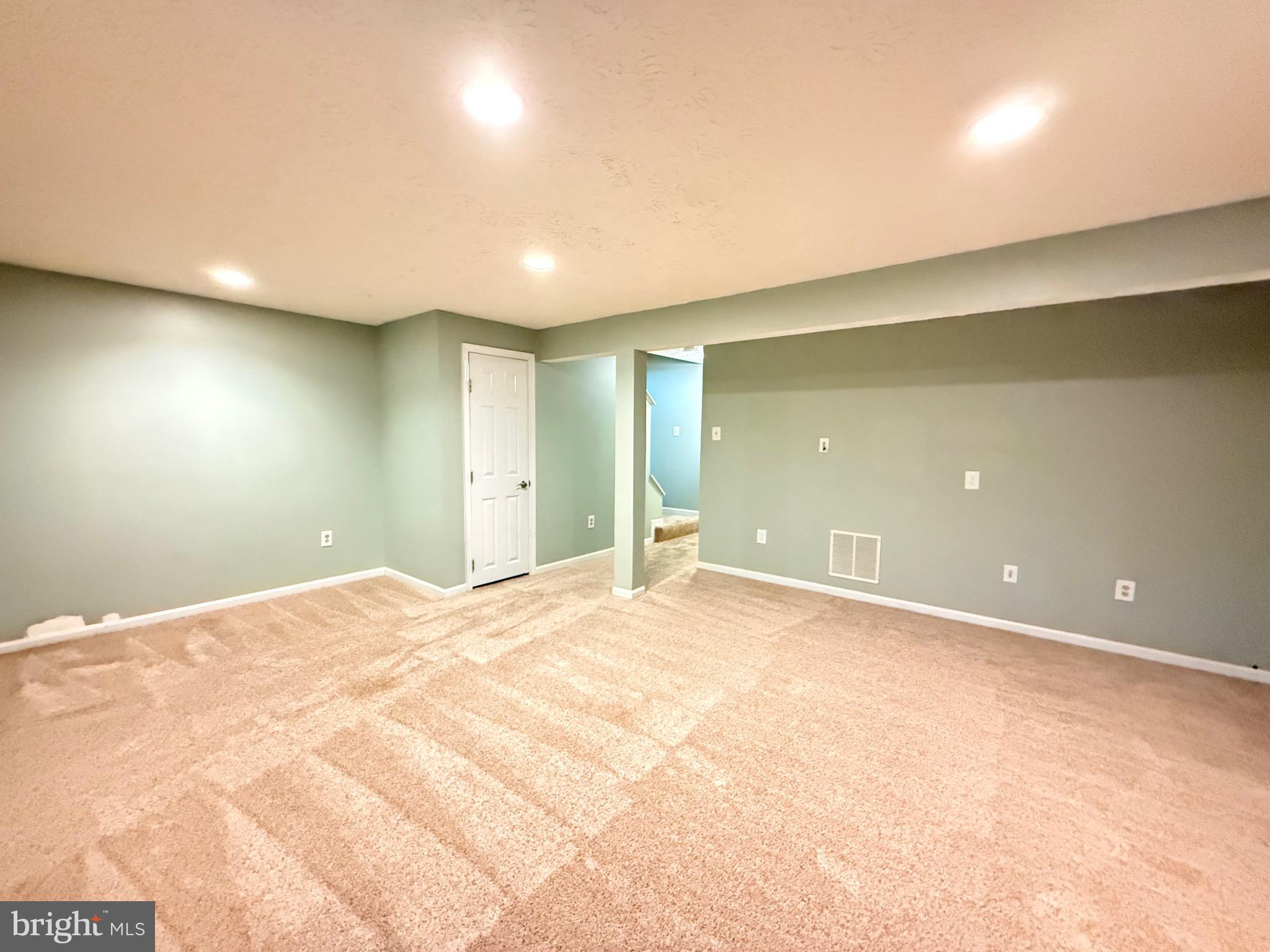 3750 Timahoe Circle Baltimore, MD 21236 - Photo 22 of 29 a view of an empty room with a window