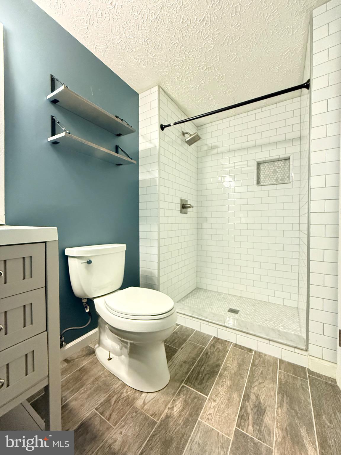 3750 Timahoe Circle Baltimore, MD 21236 - Photo 25 of 29 a bathroom with a toilet and a shower