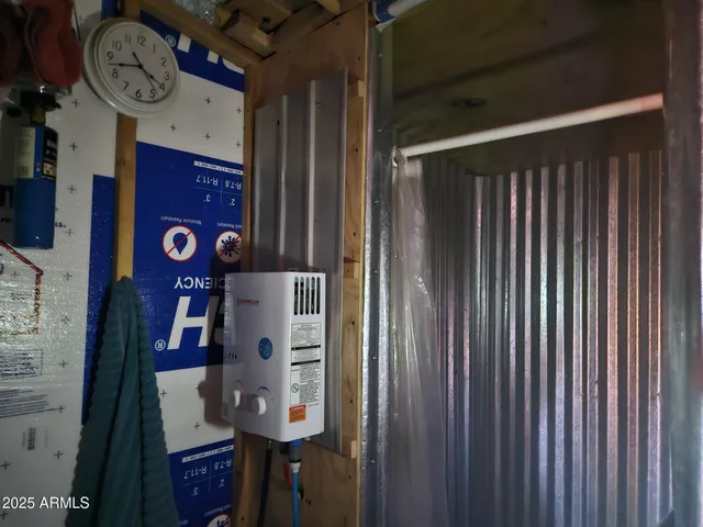 a black and white building with black door