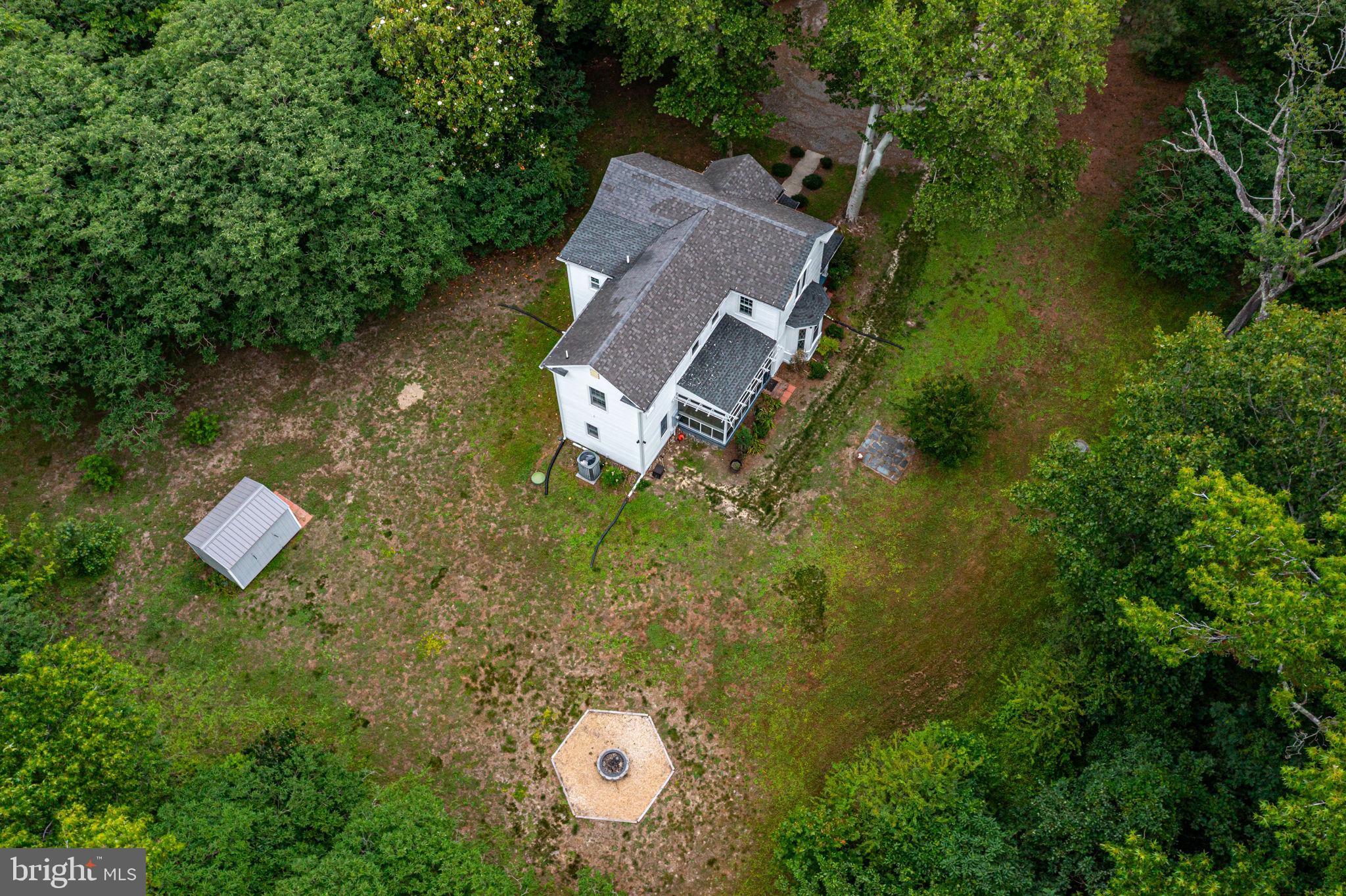 3952 Irvington Road Irvington, VA 22480 - Photo 59 of 77 an aerial view of a house with garden space and swimming pool