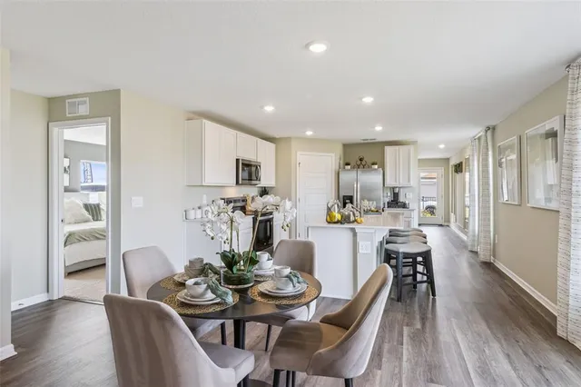 a view of a dining room with furniture