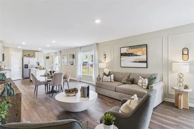 a living room with furniture and a table