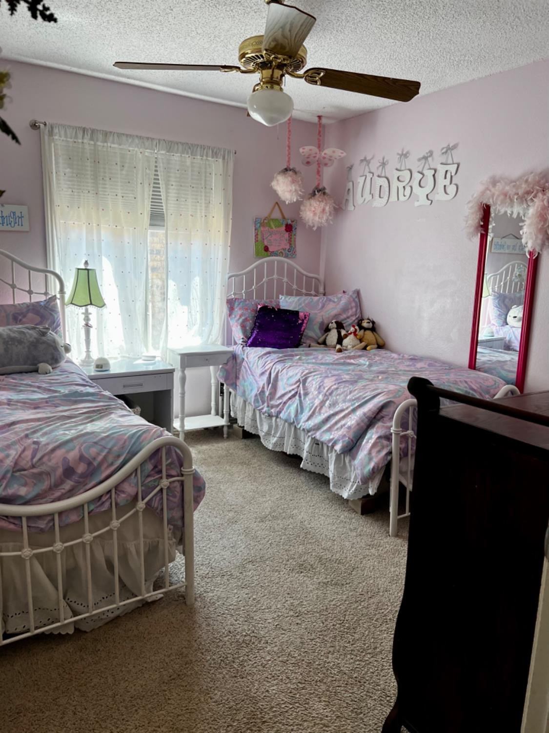 5724 92nd Street Lubbock, TX 79424 - Photo 13 of 18 a bedroom with a bed and a window