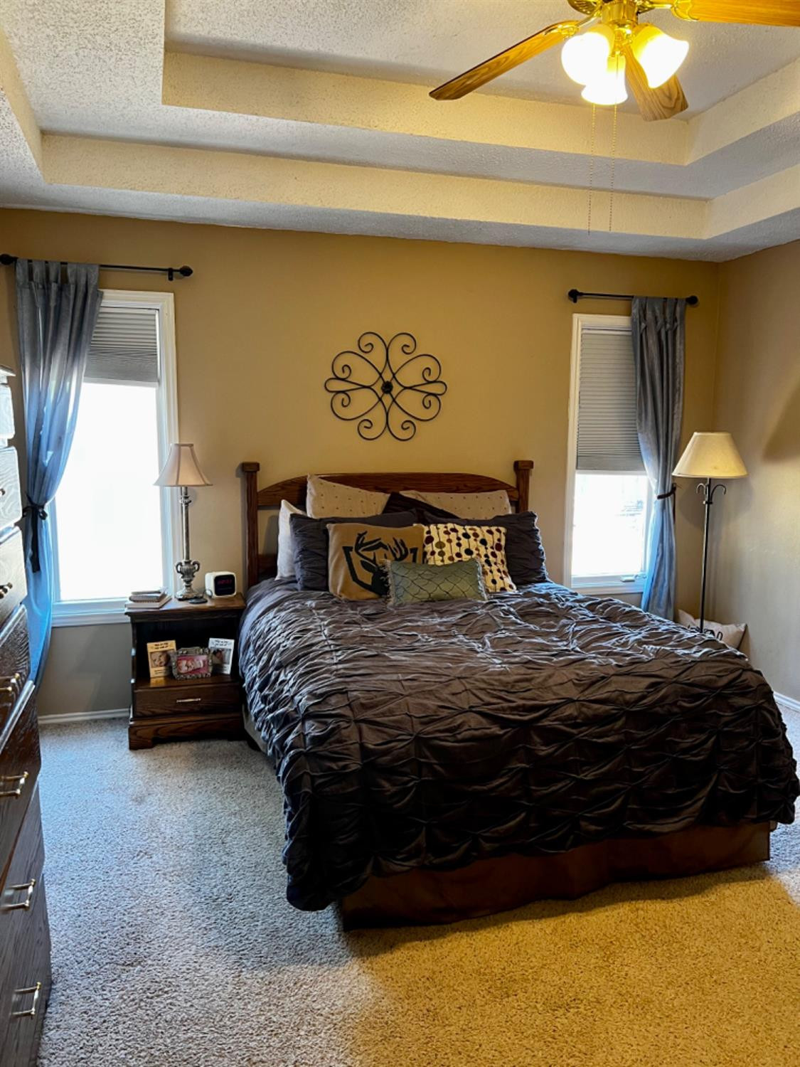 5724 92nd Street Lubbock, TX 79424 - Photo 9 of 18 a bedroom with a bed and a window
