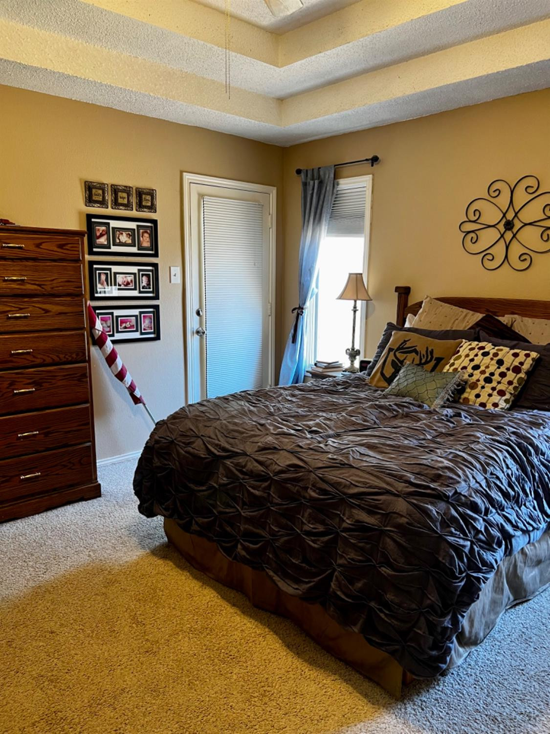 5724 92nd Street Lubbock, TX 79424 - Photo 10 of 18 a bedroom with a bed and a window