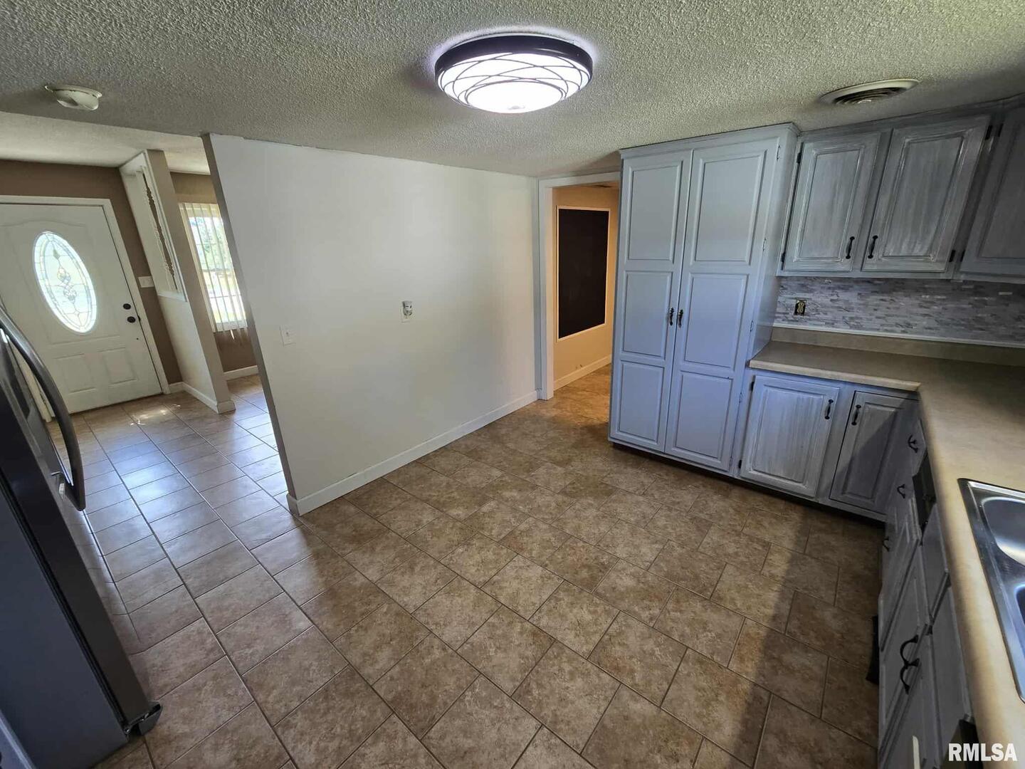 108 Mockingbird Lane Woodlawn, IL 62898 - Photo 35 of 59 a view of a kitchen with a sink
